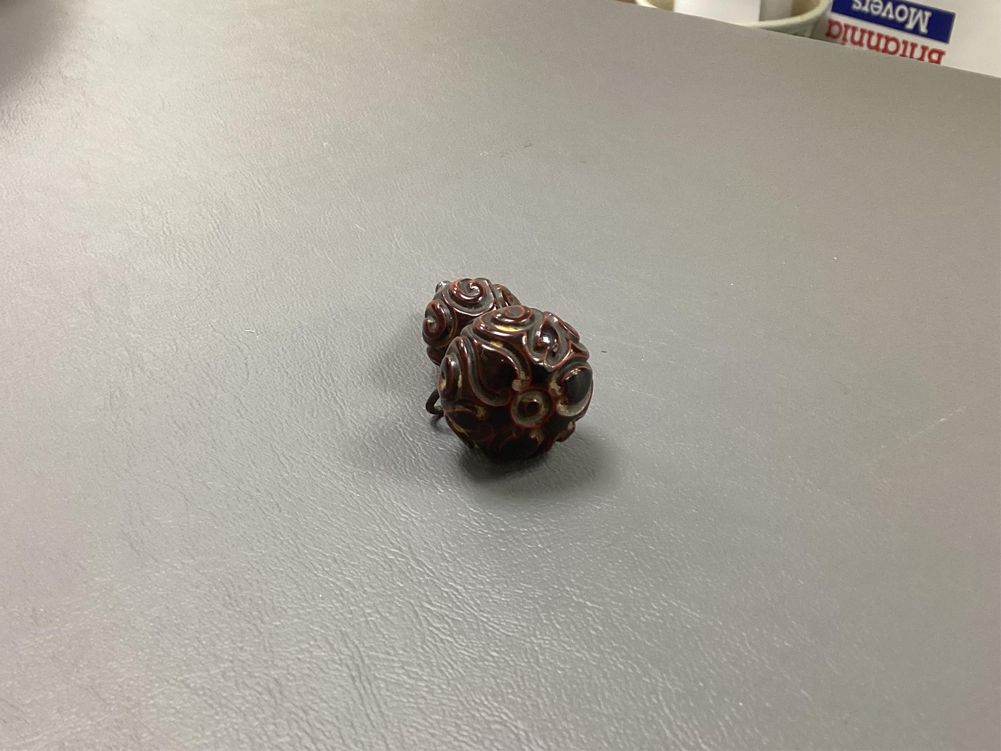A Japanese guribori lacquer double gourd shaped netsuke, Edo period, late 18th/early 19th century